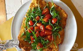 Cotoletta(vitello) primavera(rucola,pomodorini)