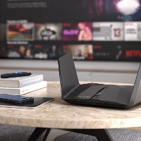 NETGEAR Nighthawk RAXE500 - Router wireless - switch a 4 porte - GigE, 2.5 GigE - 802.11a/b/g/n/ac/ax - multibanda
