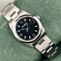 Rolex Oyster Perpetual 31mm Black Dial 3-6-9