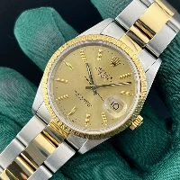 Rolex Oyster Perpetual Date 34mm Acciaio Oro Champagne